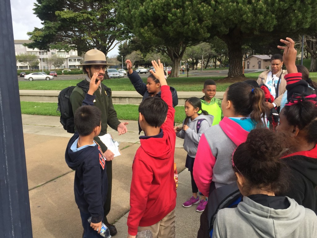 Park Ranger Nate talks to fourth grade students from Olinda Elementary School at the Rosie the Riveter Memorial during an Every Kid In a Park field trip.