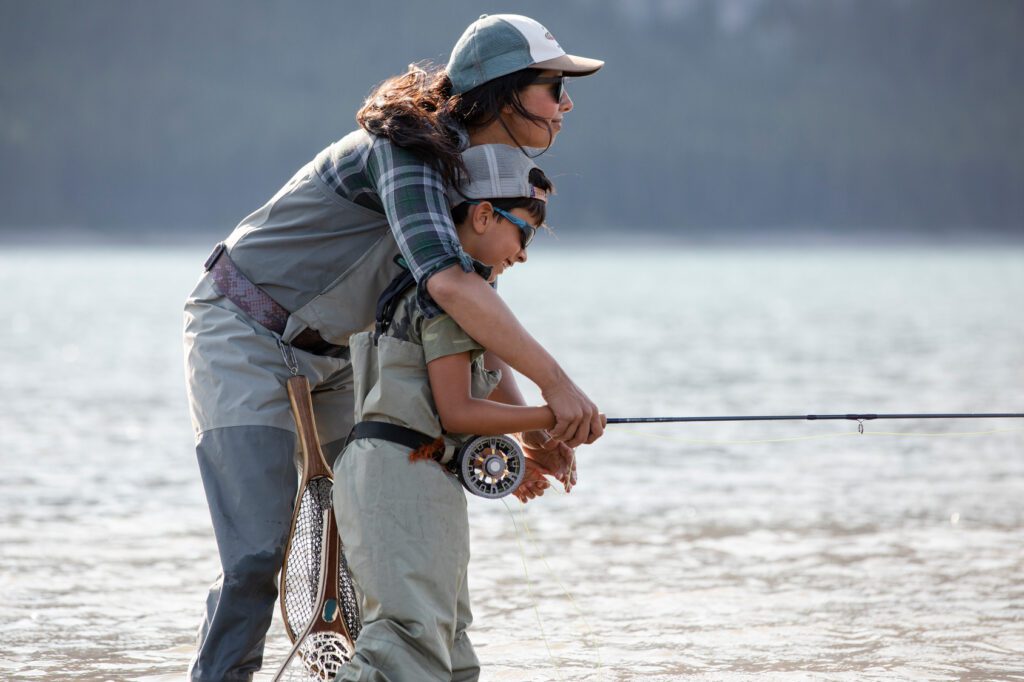 https://outdoorindustry.org/wp-content/uploads/2023/07/Mother-and-son-fly-fishing-1024x682.jpeg